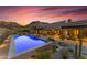 Relaxing pool area with a built-in barbecue at 8912 W Roberta Ln, Peoria, AZ 85383