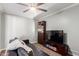 Gathering room featuring a black leather sofa and built-in shelving at 920 E 10Th Pl, Mesa, AZ 85203