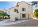 Two-story building with Spanish-style architecture and landscaping at 9305 E Purdue Ave # 265, Scottsdale, AZ 85258