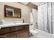 Bathroom boasts vanity, toilet, and bathtub at 9543 E Palomino Pl, Sun Lakes, AZ 85248