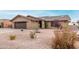 Charming single story home with gravel landscaping at 9543 E Palomino Pl, Sun Lakes, AZ 85248