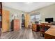 Home office features wood desk and built-in shelving at 9543 E Palomino Pl, Sun Lakes, AZ 85248