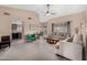 Open living room with a view into the kitchen area at 9543 E Palomino Pl, Sun Lakes, AZ 85248