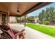 Covered patio with ceiling fan, offering relaxing outdoor space at 9543 E Palomino Pl, Sun Lakes, AZ 85248