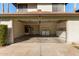 Attached garage with washer, dryer, and storage cabinets at 10036 W Montecito Ave, Phoenix, AZ 85037