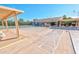 Shuffleboard courts with covered seating areas and nearby basketball courts at 1014 Leisure World --, Mesa, AZ 85206