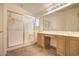 Large bathroom with a walk-in shower and double vanity at 11517 W Coral Snake Ct, Surprise, AZ 85378
