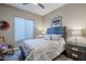 Cozy bedroom with gray headboard and window blinds at 13455 W Miner Trl, Peoria, AZ 85383