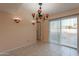 Dining area with tile floor and sliding glass doors at 1403 N Salida Del Sol --, Chandler, AZ 85224