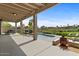 Relaxing pool area with patio furniture and mountain views at 16919 E Nicklaus Dr, Fountain Hills, AZ 85268