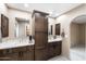 Modern bathroom with double vanity and large mirror at 1855 Leisure World --, Mesa, AZ 85206