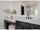 Elegant bathroom with marble countertop and dark cabinetry at 20177 E Via De Arboles --, Queen Creek, AZ 85142