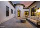 Relaxing outdoor patio area with seating and a fire pit at 20177 E Via De Arboles --, Queen Creek, AZ 85142