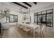 Modern farmhouse dining room with white table and wood accents at 20177 E Via De Arboles --, Queen Creek, AZ 85142