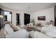 Relaxing Gathering room with comfy seating, a large TV, and plenty of natural light at 20177 E Via De Arboles --, Queen Creek, AZ 85142