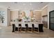 Modern kitchen with large island and pendant lighting at 20177 E Via De Arboles --, Queen Creek, AZ 85142