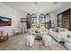 Bright living room featuring ample natural light and cozy furniture at 20177 E Via De Arboles --, Queen Creek, AZ 85142