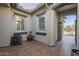 Private courtyard with tile flooring and potted plants at 2033 W Steed Rdg, Phoenix, AZ 85085