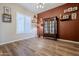 Dining room with hardwood floors and an accent wall at 2033 W Steed Rdg, Phoenix, AZ 85085