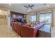 Relaxing living room with a large sectional sofa and big windows at 2033 W Steed Rdg, Phoenix, AZ 85085