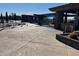 Well-appointed community pool area featuring shaded seating and beautiful landscaping at 2327 W Firethorn Way, Anthem, AZ 85086