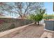 Landscaped backyard with gravel and wood fence at 2498 E Ivanhoe Ct, Gilbert, AZ 85295