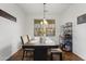 Bright dining room with hardwood floors and a charming table setting at 2747 E Megan St, Gilbert, AZ 85295