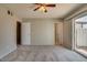 Bedroom with sliding door access to the backyard at 341 W 23Rd Ave, Apache Junction, AZ 85120