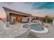 Expansive backyard oasis with pool, fire pit, and patio at 35167 N 92Nd Pl, Scottsdale, AZ 85262