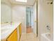 Bathroom with double vanity and access to hallway at 3605 W Bethany Home Rd # 10, Phoenix, AZ 85019