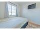 Bedroom with double bed and wall-mounted TV at 3605 W Bethany Home Rd # 10, Phoenix, AZ 85019