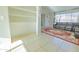 Living room features a brown leather sectional sofa and red area rug at 3605 W Bethany Home Rd # 10, Phoenix, AZ 85019