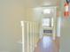 Upper hallway with access to bedrooms and loft area at 3605 W Bethany Home Rd # 10, Phoenix, AZ 85019