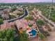 Luxury home with pool and spa, surrounded by a beautifully landscaped yard at 3773 E Donald Dr, Phoenix, AZ 85050