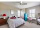 Bedroom featuring a double bed, desk and vibrant decor at 3773 E Donald Dr, Phoenix, AZ 85050