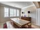 Spacious dining room with a large wooden table and bench seating at 3773 E Donald Dr, Phoenix, AZ 85050