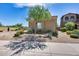 Charming home with stone accents and lush landscaping at 3773 E Donald Dr, Phoenix, AZ 85050