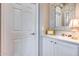Bright hallway with decorative mirror and cabinet at 3773 E Donald Dr, Phoenix, AZ 85050