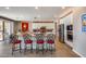 Modern kitchen featuring stainless steel appliances and an island with seating at 3773 E Donald Dr, Phoenix, AZ 85050