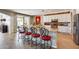 Bright kitchen boasts stainless steel appliances and an eat-in island at 3773 E Donald Dr, Phoenix, AZ 85050
