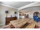 Open concept kitchen features stainless steel appliances and an island at 3773 E Donald Dr, Phoenix, AZ 85050