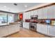 Gourmet kitchen with stainless steel appliances and a breakfast bar at 3773 E Donald Dr, Phoenix, AZ 85050