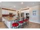Modern kitchen with white cabinets, stainless steel appliances, and a large island at 3773 E Donald Dr, Phoenix, AZ 85050