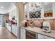 Modern kitchen with white cabinets and stainless steel appliances at 3773 E Donald Dr, Phoenix, AZ 85050