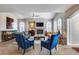 Bright living room with hardwood floors and a cozy fireplace at 3773 E Donald Dr, Phoenix, AZ 85050
