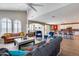 Bright and spacious living room with comfortable seating and high ceilings at 3773 E Donald Dr, Phoenix, AZ 85050