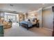 Spacious main bedroom with sitting area and ensuite bathroom at 3773 E Donald Dr, Phoenix, AZ 85050