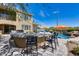 Circular bar with seating overlooking pool and backyard at 3773 E Donald Dr, Phoenix, AZ 85050