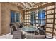 Relaxing patio seating area with table and wicker chairs at 3773 E Donald Dr, Phoenix, AZ 85050