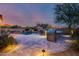 Luxury pool and spa with outdoor kitchen and seating at 3773 E Donald Dr, Phoenix, AZ 85050